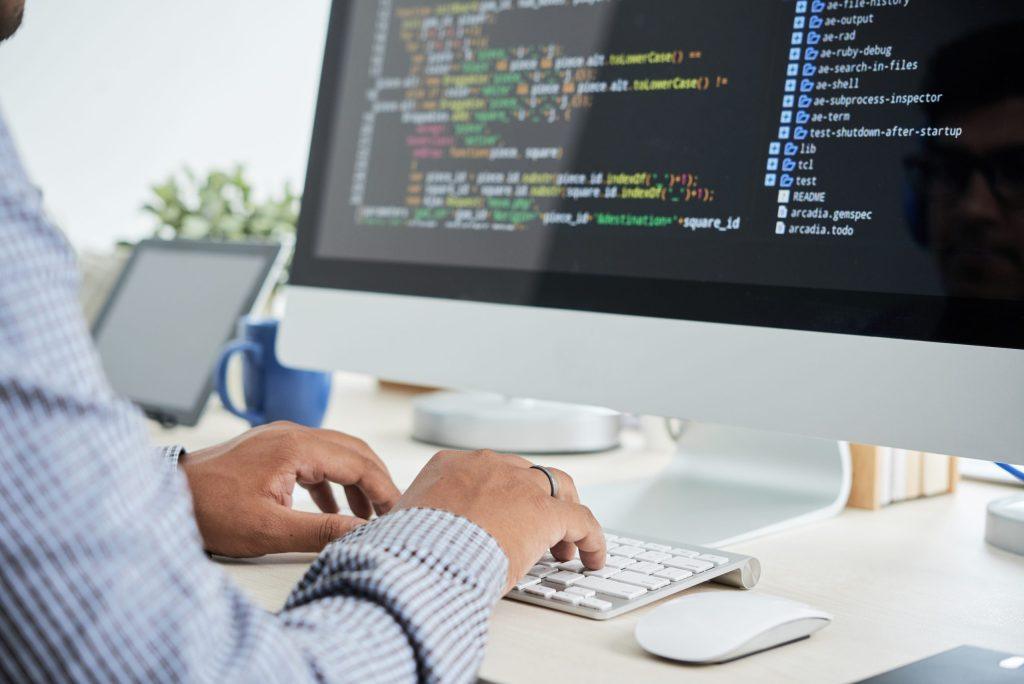 An Employee is Coding in CANWS